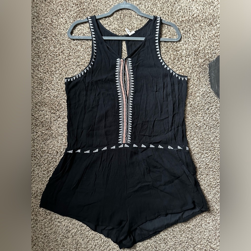 Sleeveless romper, black with pink and white detail, size large
